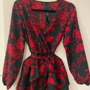 Mini long sleeve cocktail dress w/ floral pattern
